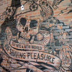 A closer look at the mural in the men's grooming section