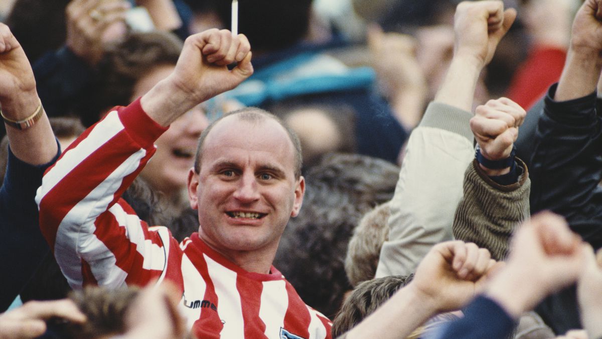 Smoking Sunderland fan celebrates a goal 1990