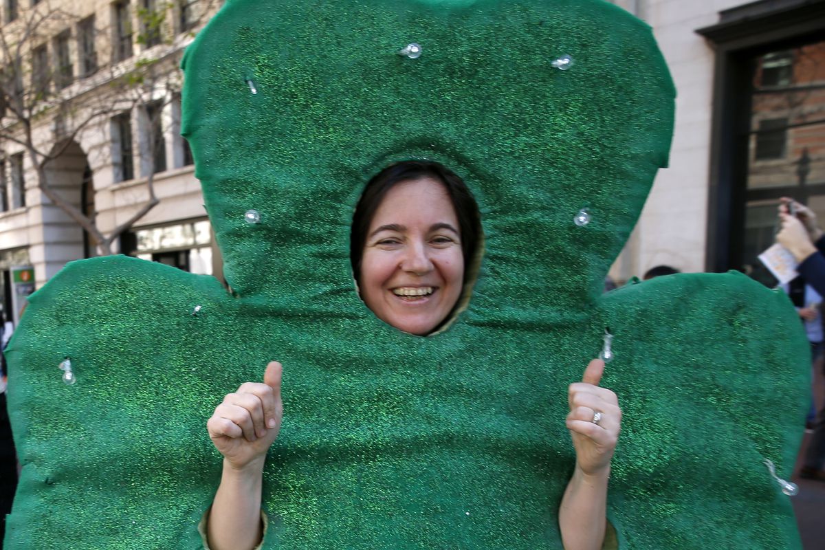 Reveler costumed as a shamrock marches in the annual St. Patrick’s Day Parade on Market Street in San Francisco, Calif. on Saturday, March 16, 2019