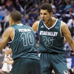 Utah Valley guard Kenneth Ogbe (25) celebrates with guard Jordan Poydras (10) after Poydras made a bucket while being fouled by a Brigham Young player during an NCAA college basketball game in Provo on Saturday, Nov. 26, 2016. Utah Valley was 18 of 37 from beyond the arc en route to a 114-101 ousting of Brigham Young.
