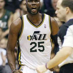 After sinking a shot Utah's Al Jefferson yells as the Utah Jazz and the Phoenix Suns play Wednesday, March 27, 2013 in EnergySolutions arena.
