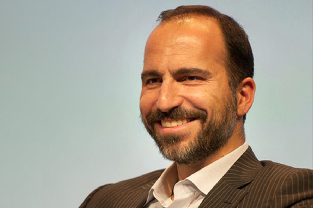 Uber CEO Dara Khosrowshahi‏ sits in front of a gray background. 
