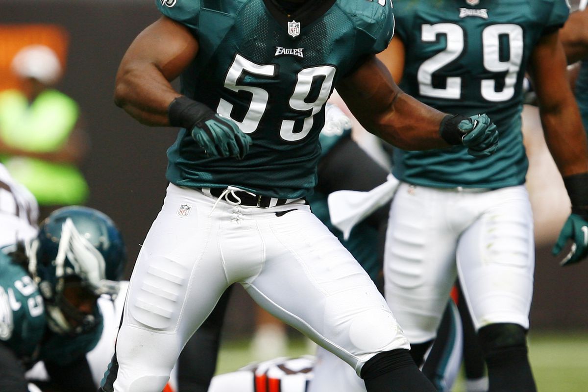 Sep 9, 2012; Cleveland, OH, USA; Philadelphia Eagles linebacker DeMeco Ryans (59) celebrates after making a defensive play against the Cleveland Browns during the 2nd quarter at Cleveland Browns Stadium. Mandatory Credit: Raj Mehta-US PRESSWIRE