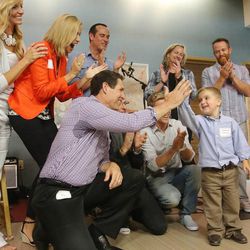 Heart transplant recipient Matthew Sperry high-fives Steve Young at Primary Childrens Medical Center in Salt Lake City Friday, June 28, 2013. Former BYU, 49er and Hall of Fame quarterback Steve Young partnered with Primary Childrens to open the Forever Young Foundation's newest initiative, Sophies Place. It is the first music therapy room built inside hospital walls in the U.S and will include a recording studio, performance area, practice room and listening station, and a space for music therapist to provide group music therapy experiences or work individually with patients.