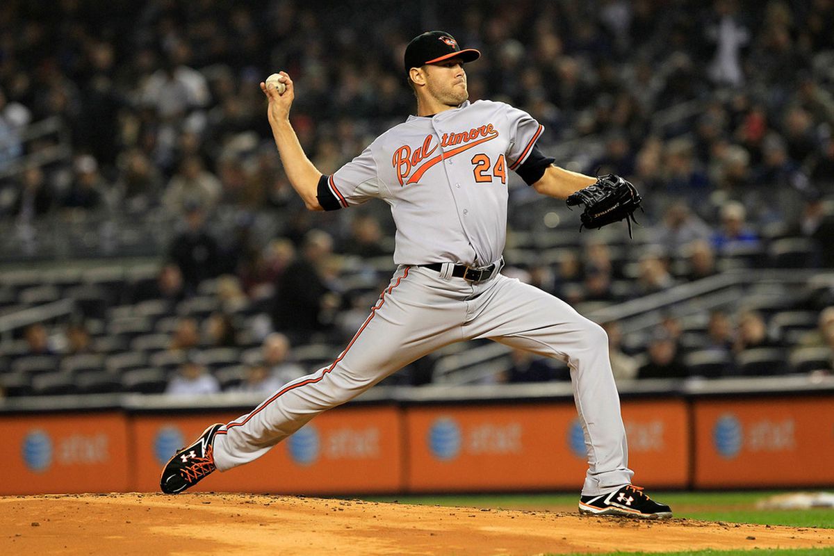 Chris Tillman of the Baltimore Orioles pitches against the New York Yankees at Yankee Stadium on April 13, 2011.  (Photo by Chris Trotman/Getty Images)
