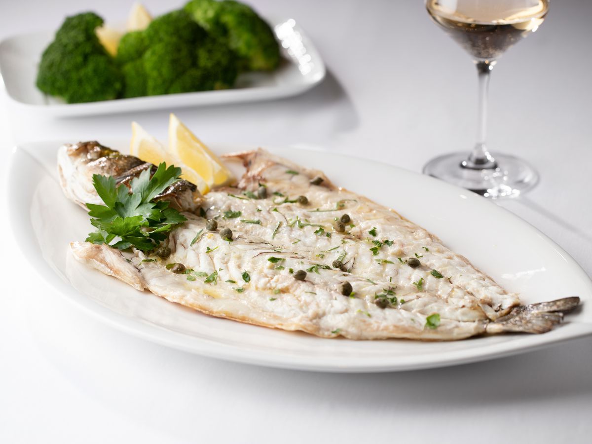 A fillet of loup de mer with herbs and lemon