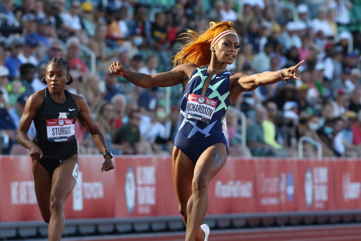 Sha’Carri Richardson celebrates her win in the semifinal of the women’s 100 meter dash at the U.S. Olympic Track &amp;amp; Field Trials at Hayward Field in Eugene.