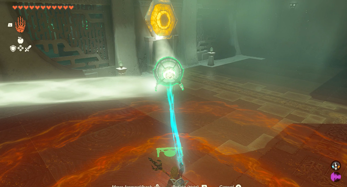 Opening a gate with two beams of light redirected to a lock in Zelda: Tears of the Kingdom