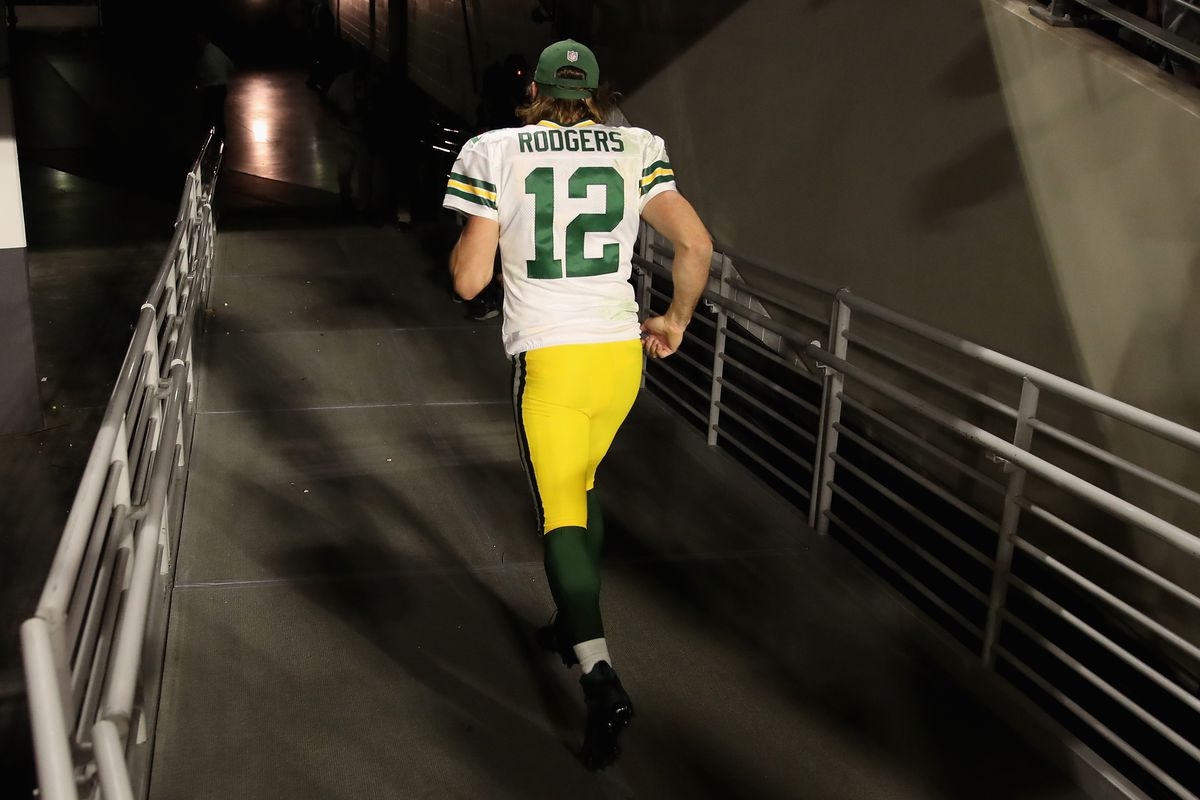 Quarterback Aaron Rodgers #12 of the Green Bay Packers walks off the field following the NFL game at State Farm Stadium on October 28, 2021 in Glendale, Arizona.