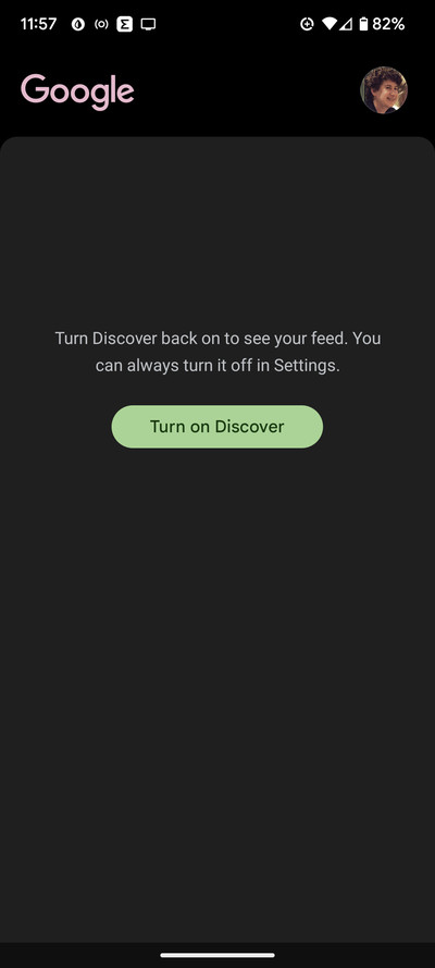A blank page with Google on top left, a personal icon on top right, and a green button with Turn on Discover in the center.
