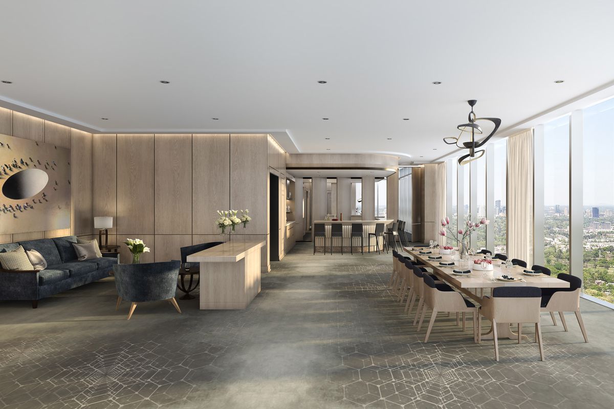 A rendering of the unit with tall ceilings, windows with views of the Atlanta skyline.