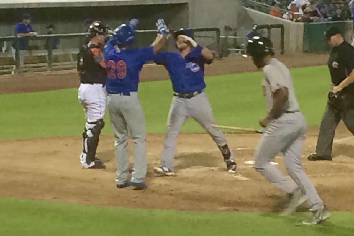 Federowicz is congratulated by Candelario after tonight's HR