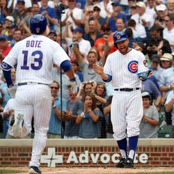David Bote and Ben Zobrist celebrate Bote’s game-tying homer against the D-Backs on July 26