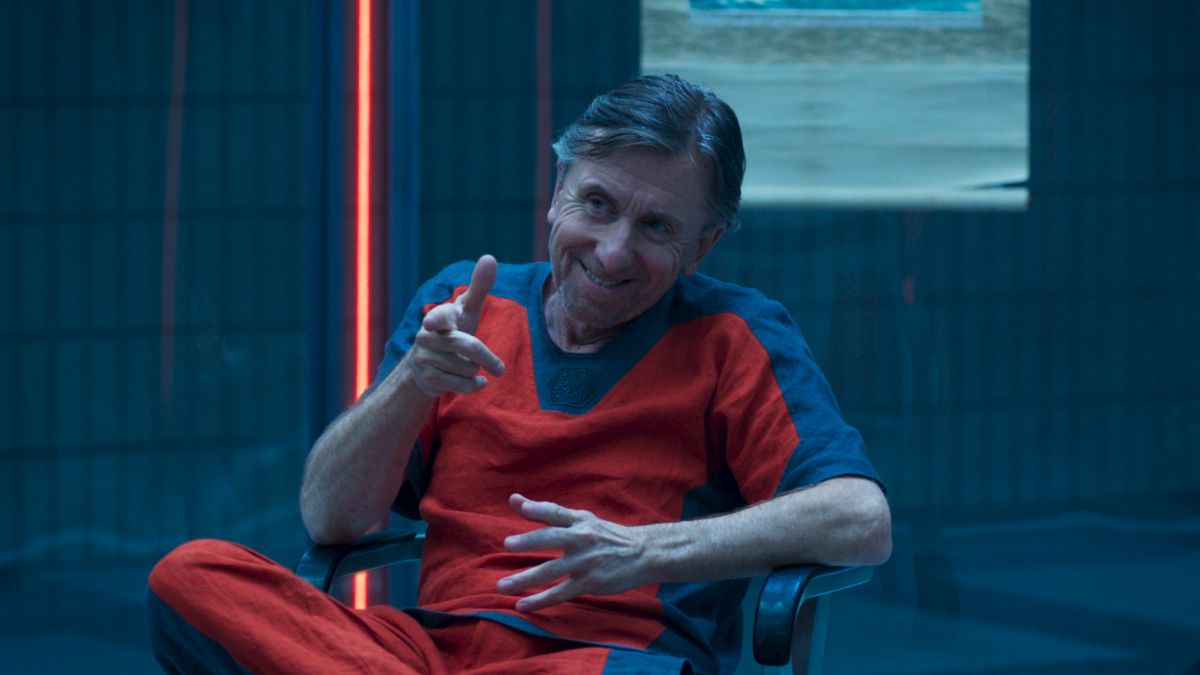 Dressed in prison fatigues, Tim Roth finger-guns roguishly from his chair as Abomination/Emil Blonsky in She-Hulk: Attorney at Law.