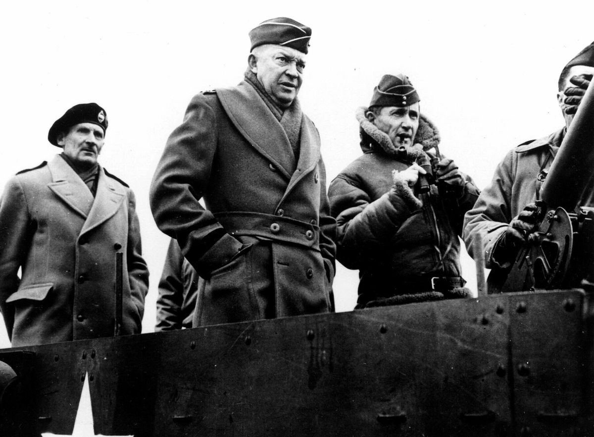 FILE - In this March 1944 file photo, U.S. World War II General Dwight D. Eisenhower, center, as Commander of the invasion of Europe. At center right is British Air Chief Marshal Sir Arthur W. Tedder and left is British Field Marshal Bernard Montgomery. P