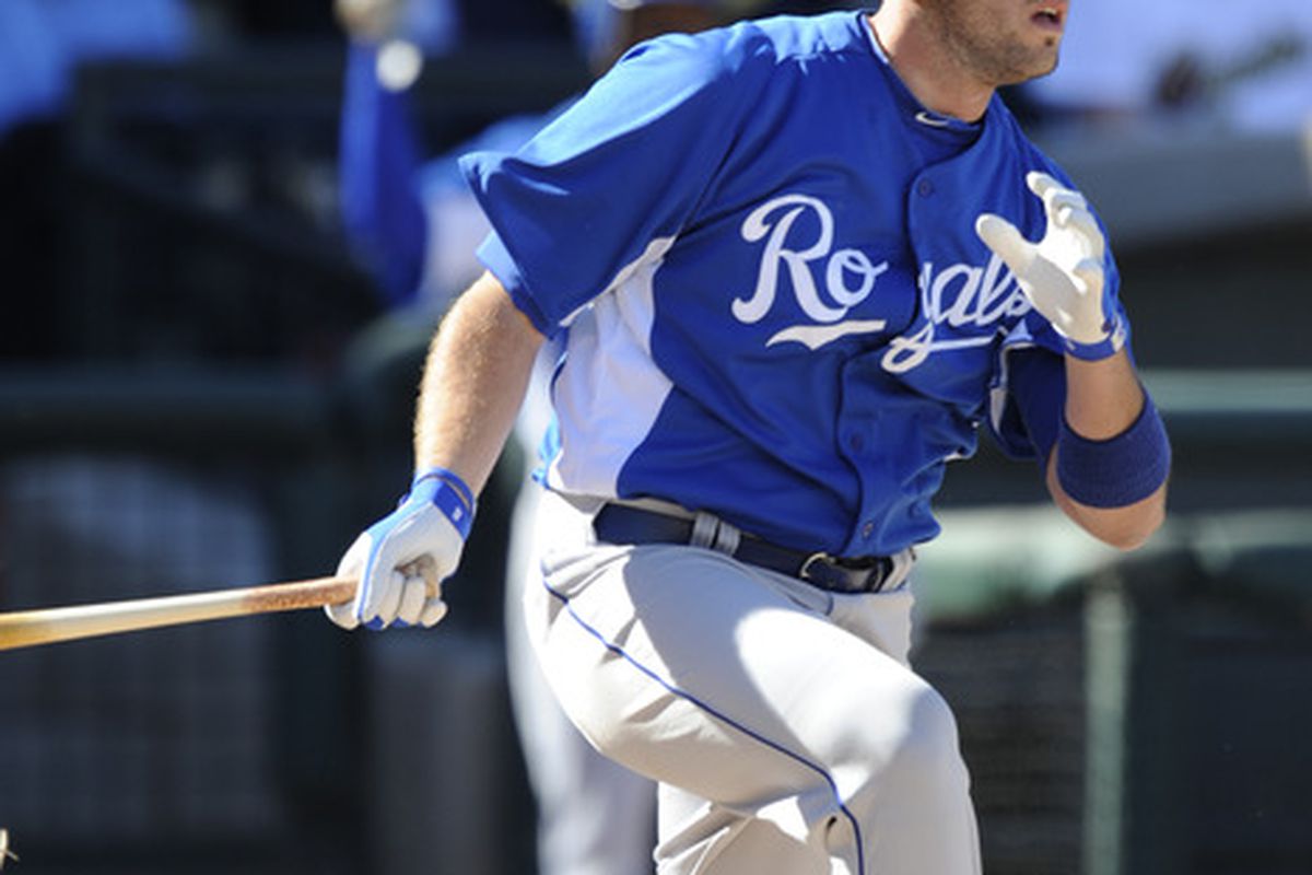 SURPISE, AZ - FEBRUARY 27: Mike Moustakas #8 of the Kansas City Royals bats during a spring training game against the Texas Rangers at Surprise Stadium on February 27, 2011 in Surprise, Arizona. (Photo by Rob Tringali/Getty Images)