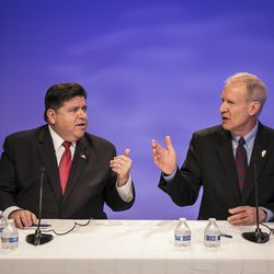 Gov. Bruce Rauner and Democrat J.B. Pritzker met in a debate Tuesday at the Sun-Times. | Rich Hein/Sun-Times