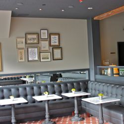 Inside the cafe, art work was collected from various thrift stores with an eye to tying in Park Tavern's sister restaurant Marlowe. 