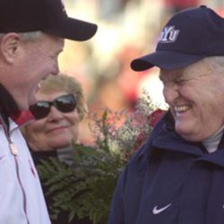 BYU coach LaVell Edwards and Utah Coach Ron McBride greet each other before the game at Rice Eccles Stadium at the University of Utah, Friday, November 24, 2000. Photo/Johanna Workman (Submission date: 11/25/2002) 