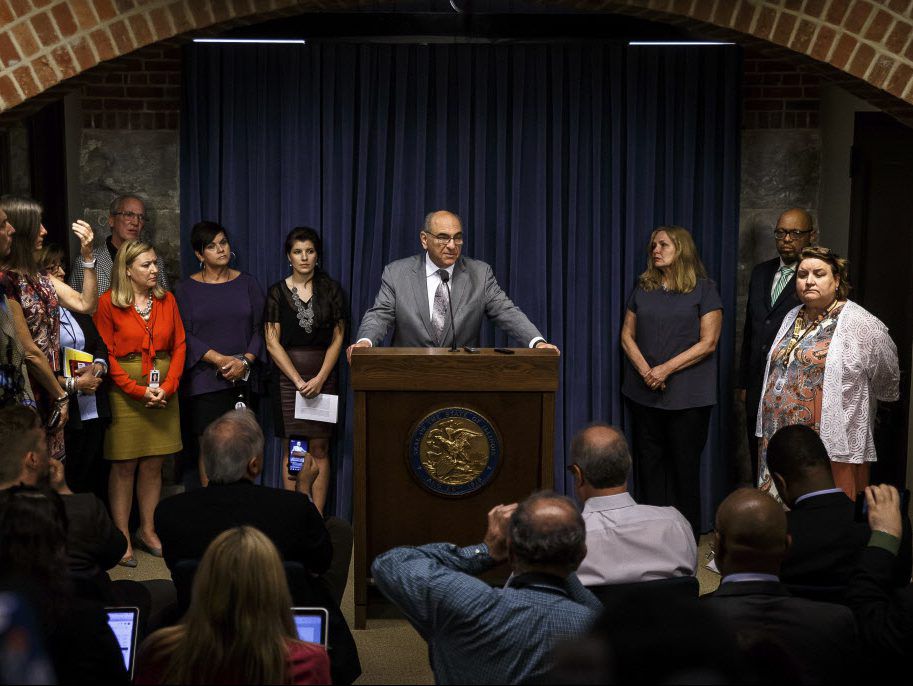 State Rep. Lou Lang, D-Skokie, is joined by supporters as he address allegations of harassment Thursday, May 31, 2018, at the state Capitol in Springfield, Ill. (Justin L. Fowler/The State Journal-Register via AP)