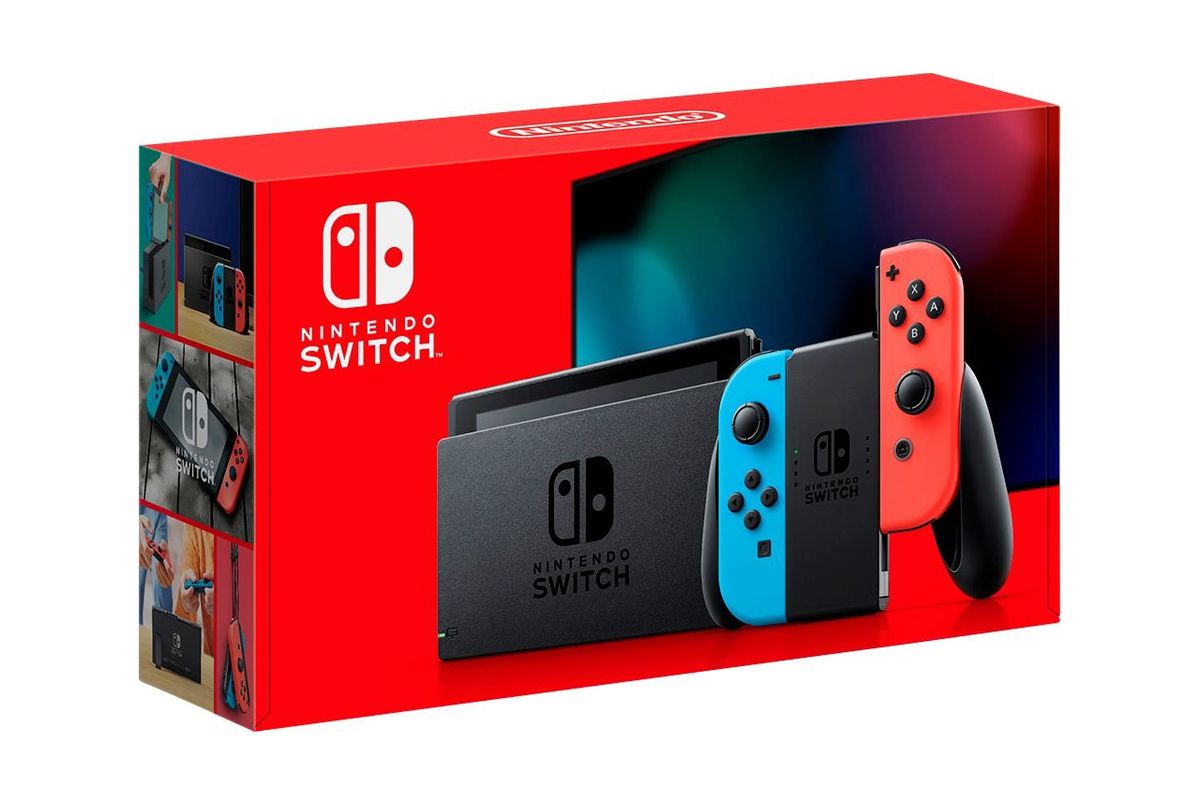 Photo of the packaging for the revised Nintendo Switch model, showing a docked Switch and controller in front of a television, with a red background