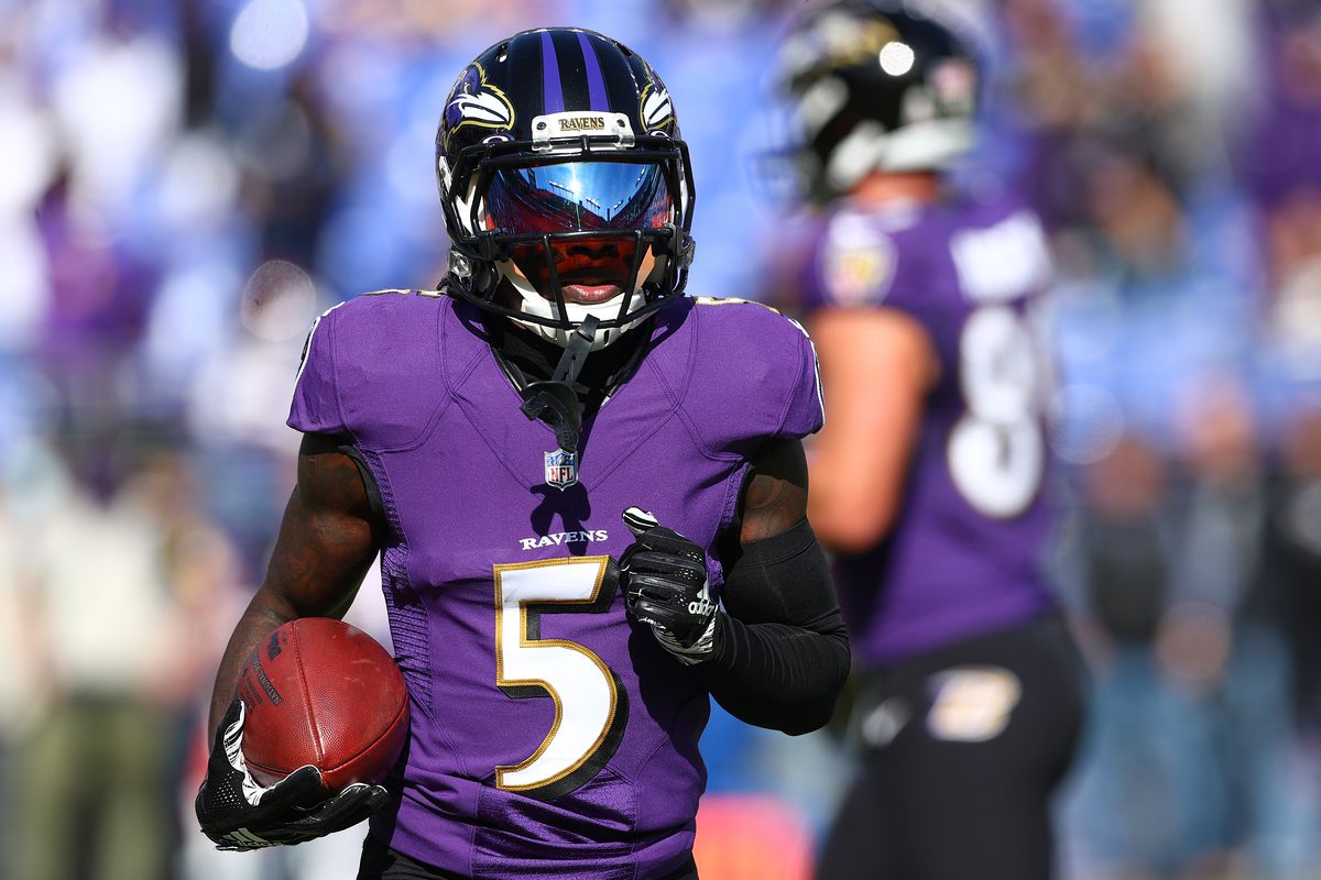 Marquise Brown #5 of the Baltimore Ravens warms up before the game against the Minnesota Vikings at M&amp;T Bank Stadium on November 07, 2021 in Baltimore, Maryland.