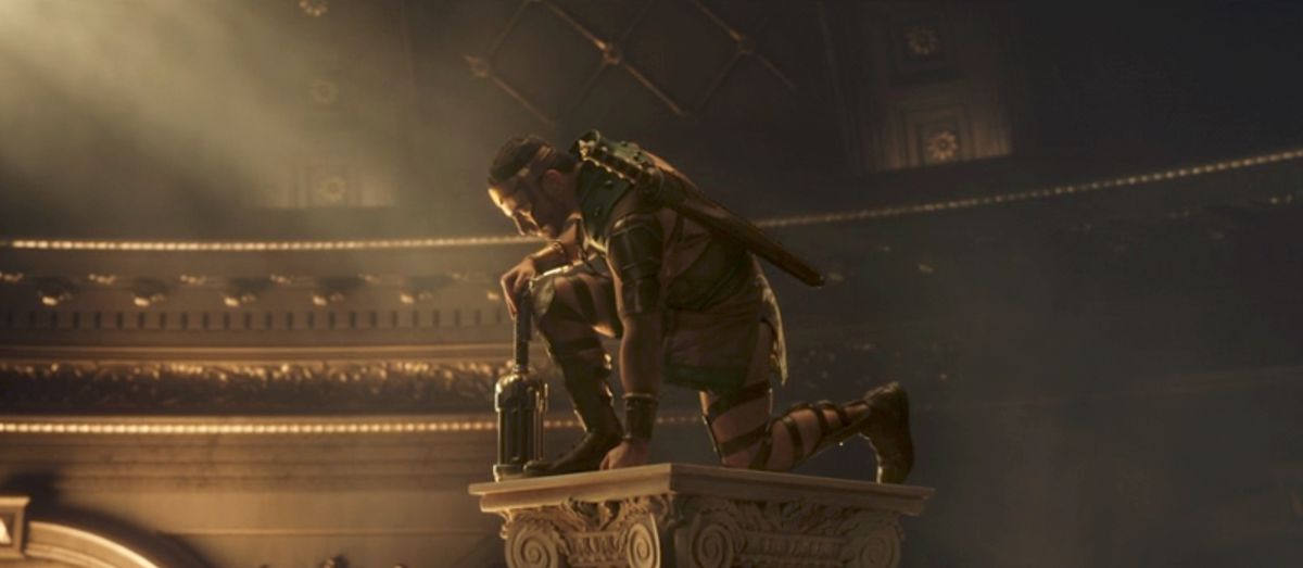 Hercules (Brett Goldstein) kneels with hammer in hand on a composite column in a shot from Thor: Love and Thunder