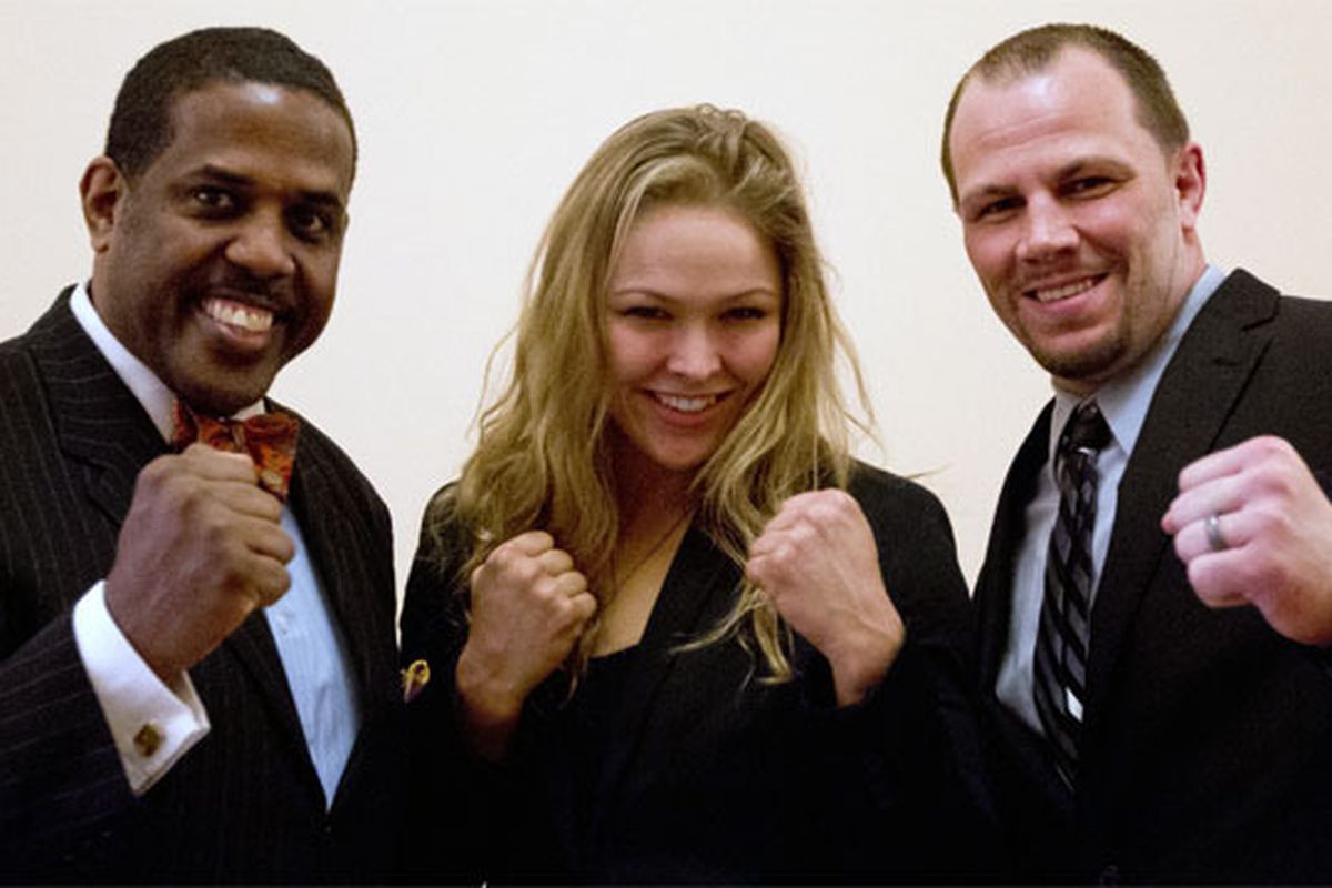 AP photo of Ronda Rousey (center) by Mike Groll via <a href="http://www.sportsnet.ca/mma/2012/04/18/rousey_ronda640_640.jpg">Sportsnet.ca</a>.