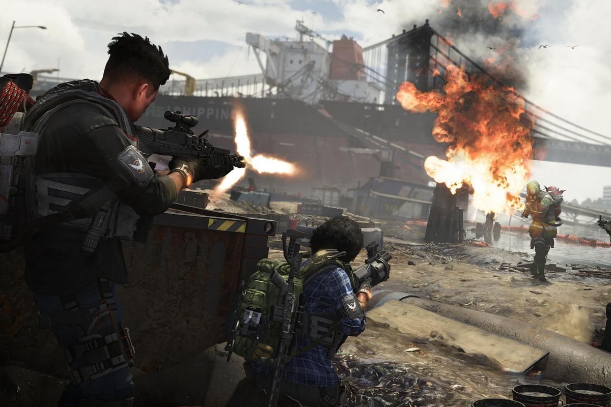 The Division 2 - players engage in a firefight against flamethrower-wielding enemies