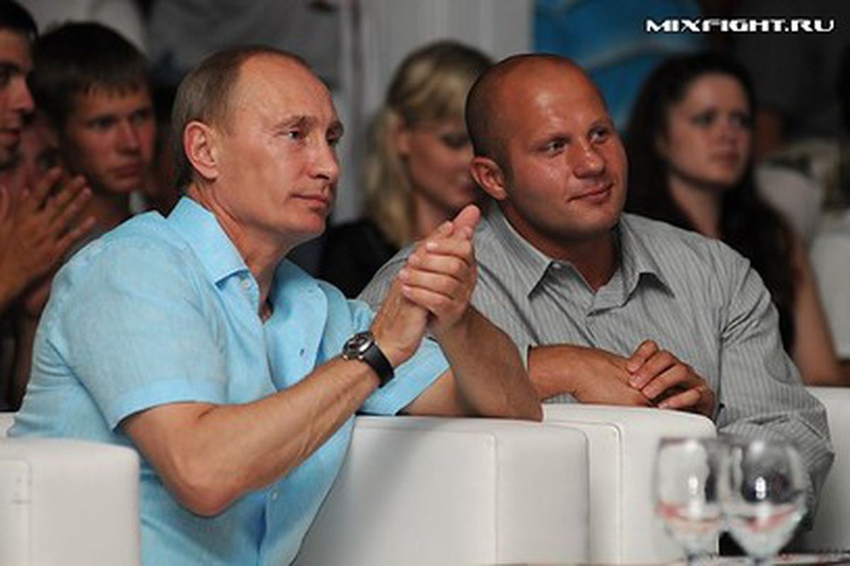 Russian Prime Minister Vladimir Putin and Fedor Emelianenko in happier times. Photo via <a href="http://www.m-1global.com/lang/en/2010/07/15/vladimir-putin-no-one-can-deny-these-men-the-courage-skill-and-daring/">M-1 Global</a>.
