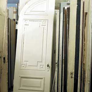 <p>These arched-top Italianate doors would make for a dramatic entrance in a front parlor</p>