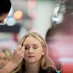 Makeup stylist Cydnie Tallman, left, applies makeup to Rylee Bess, 14, ahead of a photo shoot at the Macy's at City Creek Center in Salt Lake City on Friday, Dec. 9, 2016. Rylee, of Perry, has been diagnosed with cystic fibrosis and was granted a makeover by Macy's and Make-A-Wish Utah as part of the retailer's National Believe Day.