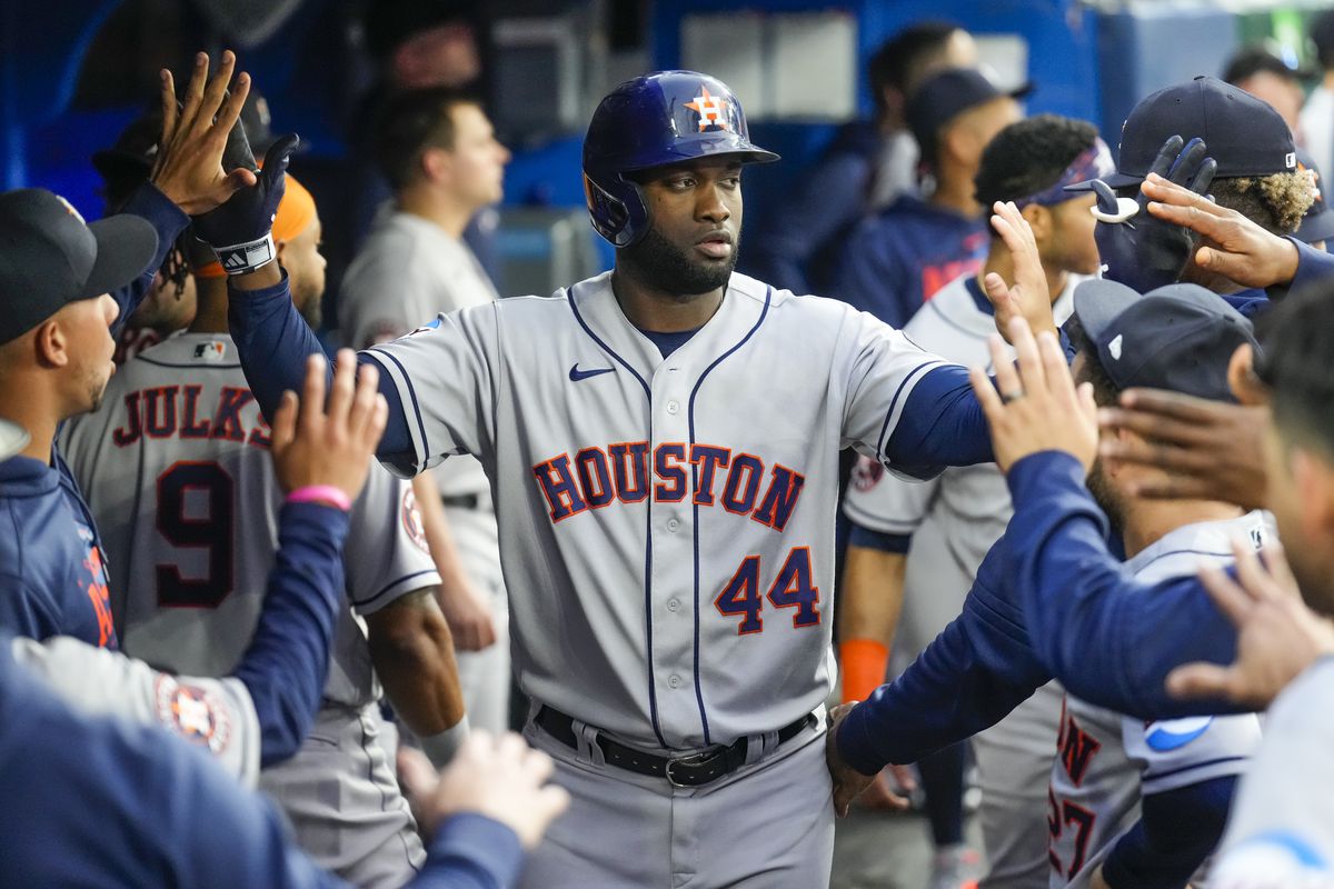 Yordan Alvarez of Houston Astros celebrates a home run in the dugout against the Toronto Blue Jays during the fourth inning in their MLB game at the Rogers Centre on June 5, 2023 in Toronto, Ontario, Canada.