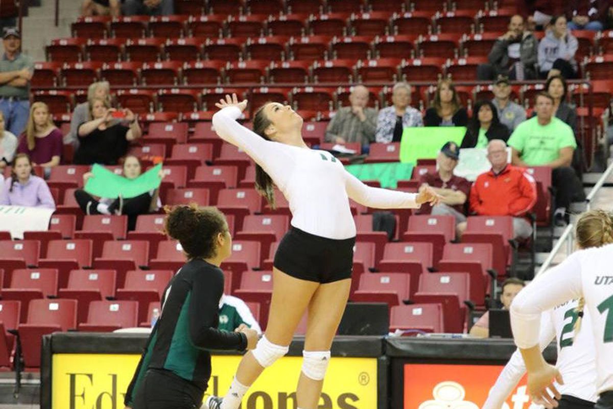 Utah Valley junior outside hitter Lexi Thompson (center) raises for an attack during Friday's tournament semifinal contest against CSU Bakersfield. Thompson finished the match with 11 kills and three blocks.