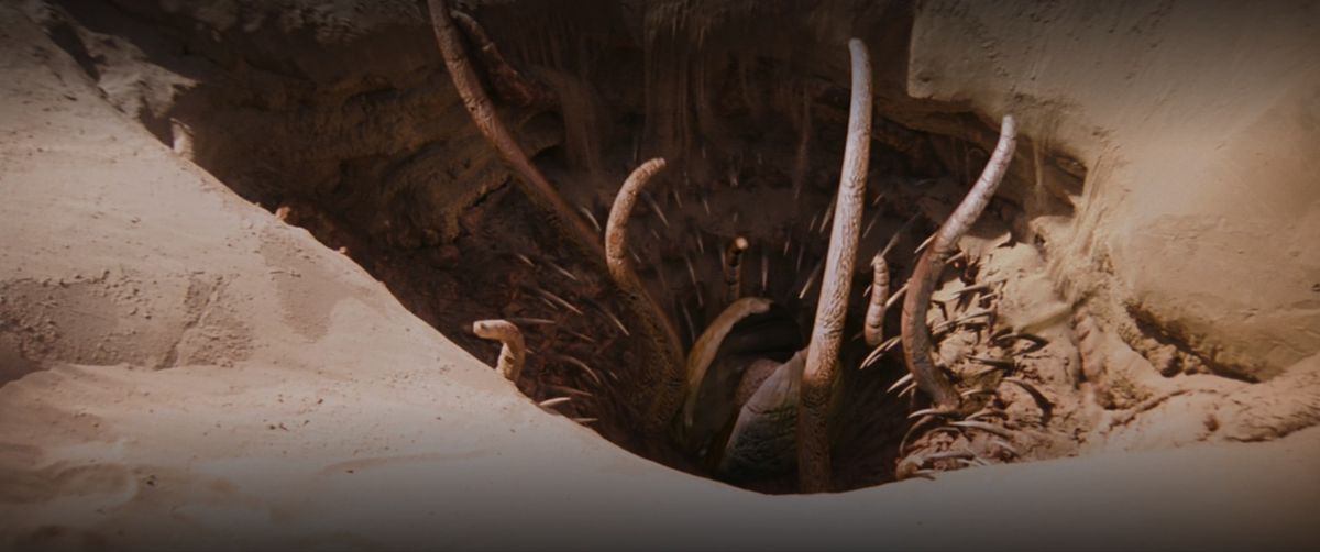 The Sarlacc pit with its birdlike mouth and many tentacles in Return of the Jedi