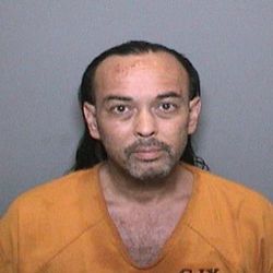 This booking video image released by the Orange County Sheriff's Department shows 51-year-old Forrest Gordon Clark, who was booked into Orange County jail in Santa Ana, Calif., Wednesday, Aug. 8, 2018. Clark was arrested in connection with the so-called Holy Fire, which has burned more than 6 square miles in the Santa Ana Mountains. Clark was booked on suspicion of two counts of felony arson, and one count each of felony threat to terrorize and misdemeanor resisting arrest. (Orange County Sheriff's Department via AP)