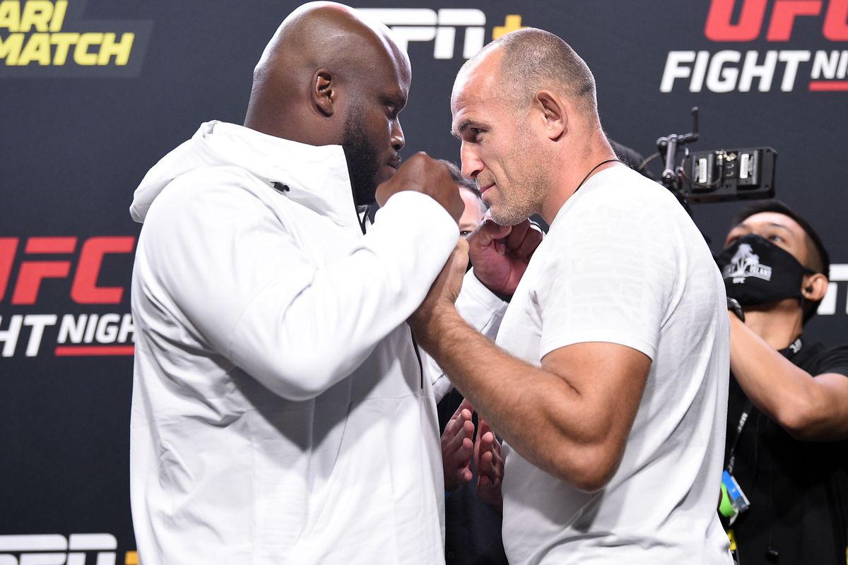 Opponents Derrick Lewis and Aleksei Oleinik of Russia face off during the UFC Fight Night weigh-in at UFC APEX on August 07, 2020 in Las Vegas, Nevada.