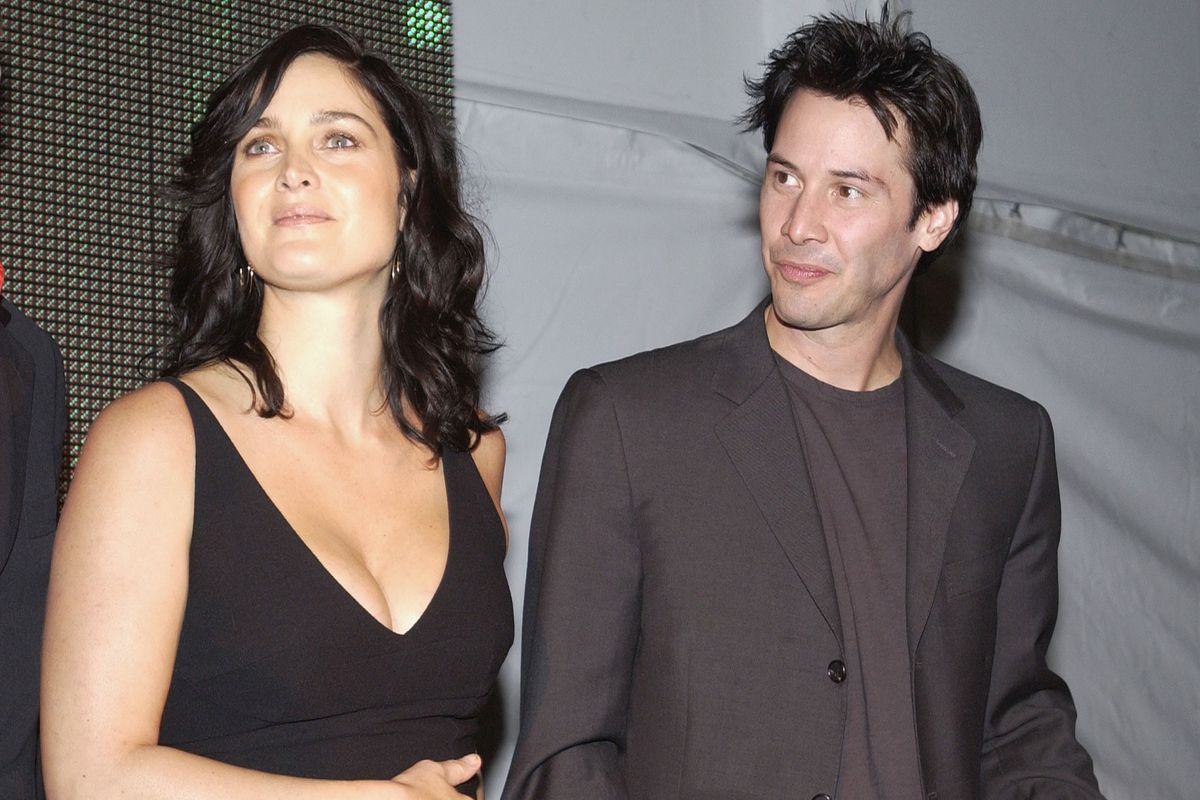 Carrie-Anne Moss and Keanu Reeves