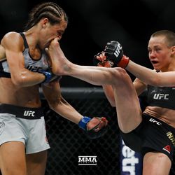 Rose Namajunas kicks Joanna Jedrzejczyk at UFC 223.