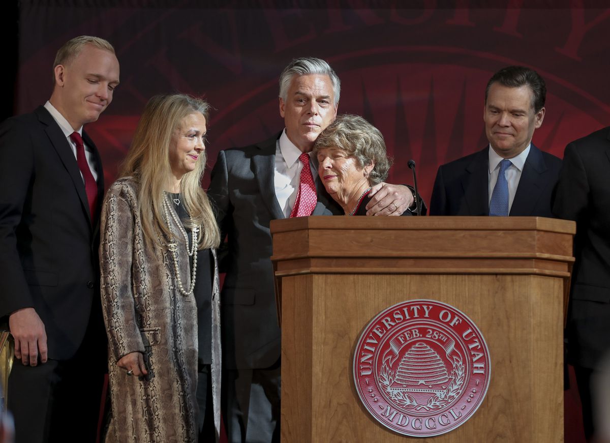Karen Huntsman, fourth from left, hugs son Jon Jr., former governor of Utah, as other family members look on during a press conference at the University of Utah’s Park Building in Salt Lake City on Monday, Nov. 4, 2019, where the Huntsman family announced a $150 million commitment to establish the Huntsman Mental Health Institute at the U. The funding, pledged over 15 years, will be used to support research, expand access to patient care and build awareness about mental health.