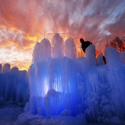 Mason Holmes works in Midway on Tuesday, Dec. 20 to build the Midway Ice Castles.