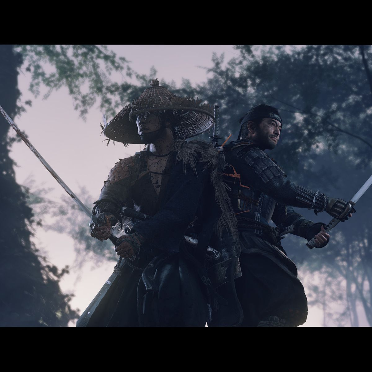 Two characters fight together with swords, back to back, in a forest in Ghost of Tsushima
