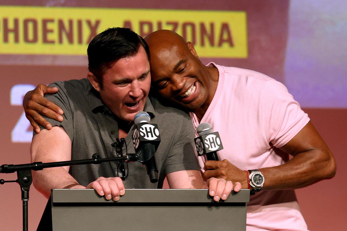 Chael Sonnen and Anderson Silva embrace during a press event for the ‘Spider’’s upcoming PPV boxing match against Jake Paul.