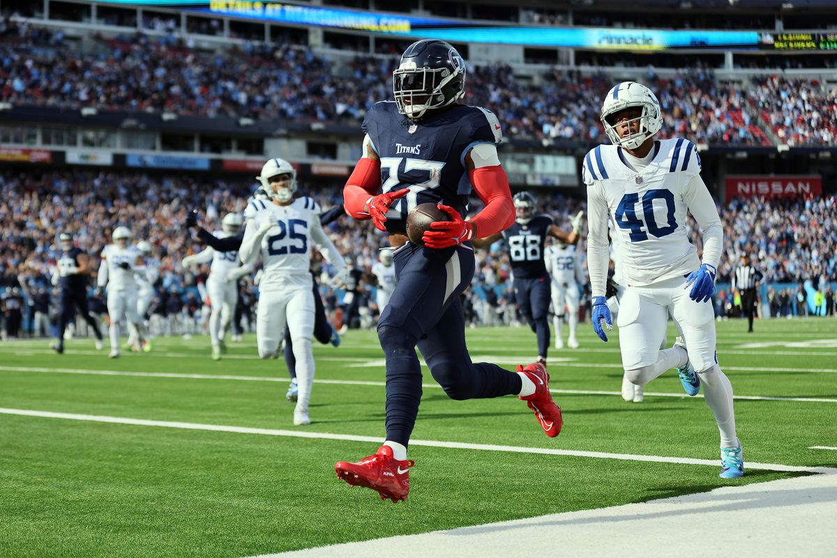 Derrick Henry #22 of the Tennessee Titans carries the ball for a touchdown against the Indianapolis Colts during the first quarter of the game at Nissan Stadium on December 03, 2023 in Nashville, Tennessee.