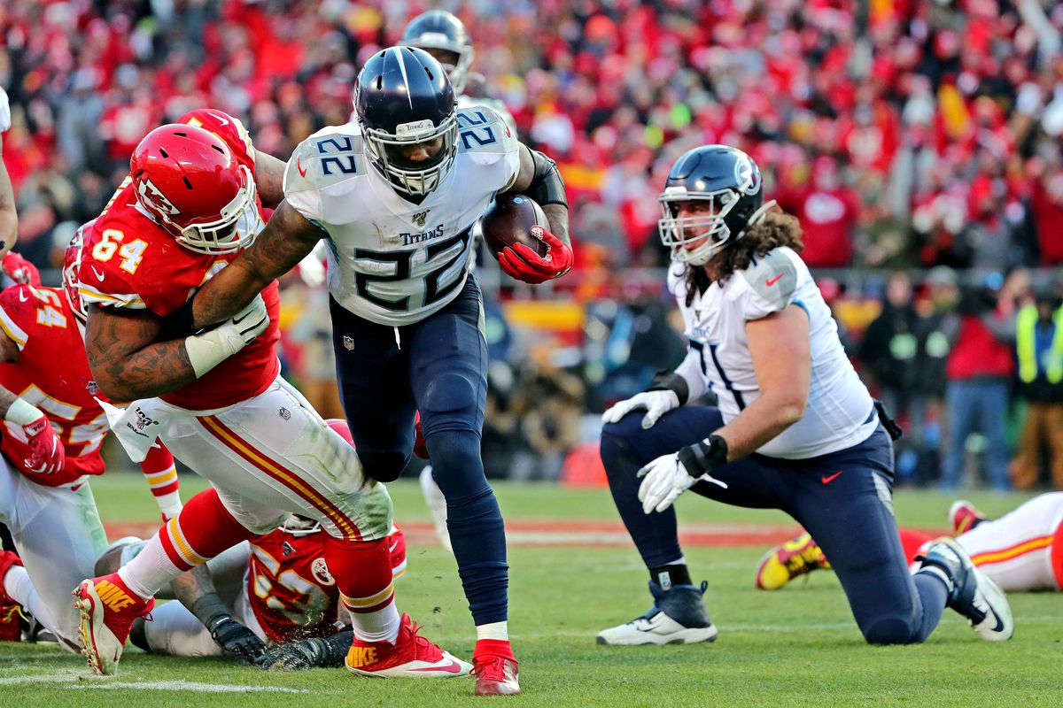 Kansas City Chiefs defensive tackle Mike Pennel tackles Tennessee Titans running back Derrick Henry during the second half in the AFC Championship Game at Arrowhead Stadium.