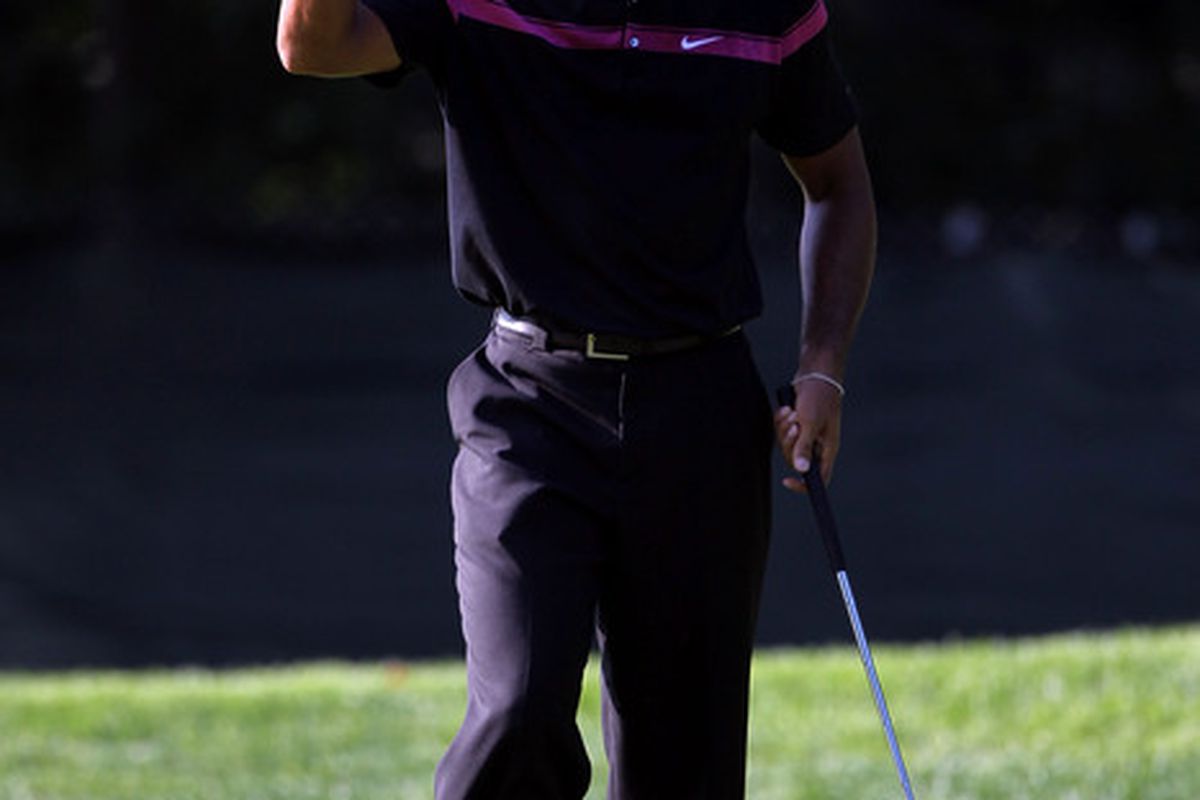 PARAMUS NJ - AUGUST 26:  Tiger Woods reacts after he made a birdie on the seventh hole during the first round of The Barclays at the Ridgewood Country Club on August 26 2010 in Paramus New Jersey.  (Photo by Hunter Martin/Getty Images)