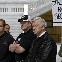 From left, David Kirkham of the Utah tea party, former South Salt Lake Mayor Wes Losser and former Salt Lake City Mayor Rocky Anderson join forces to sign a petition in opposition of the changes to the GRAMA Act that were signed into law this legislative session in the Utah State Capitol Rotunda on March 16, 2011. Anderson announced on Nov. 30, 2011, that he is running for president under the newly created Justice Party.