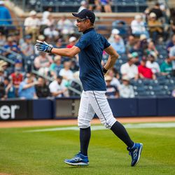 Ichiro Suzuki of the Seattle Mariners runs across the field before a Spring Training exhibition game against Team Canada at Peoria Stadium on March 09, 2023 in Peoria, Arizona.