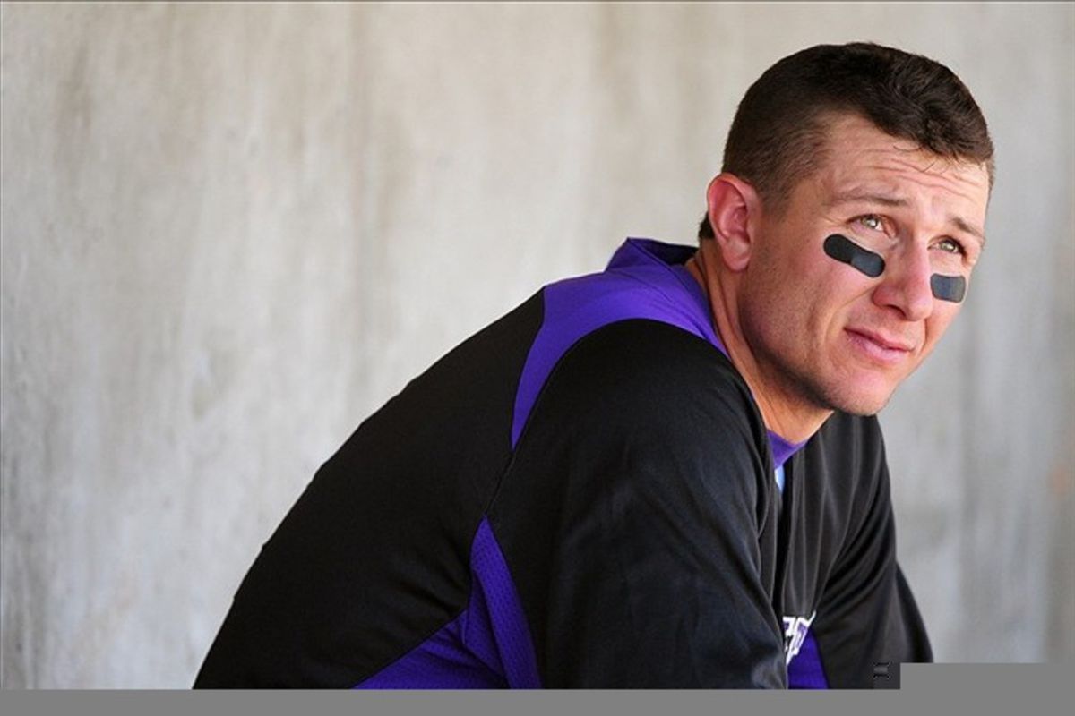 March 15, 2012; Scottsdale, AZ, USA; Colorado Rockies shortstop Troy Tulowitzki (2) sits in the dugout during the fifth inning against the Chicago Cubs at Salt River Fields. Mandatory Credit: Kyle Terada-US PRESSWIRE