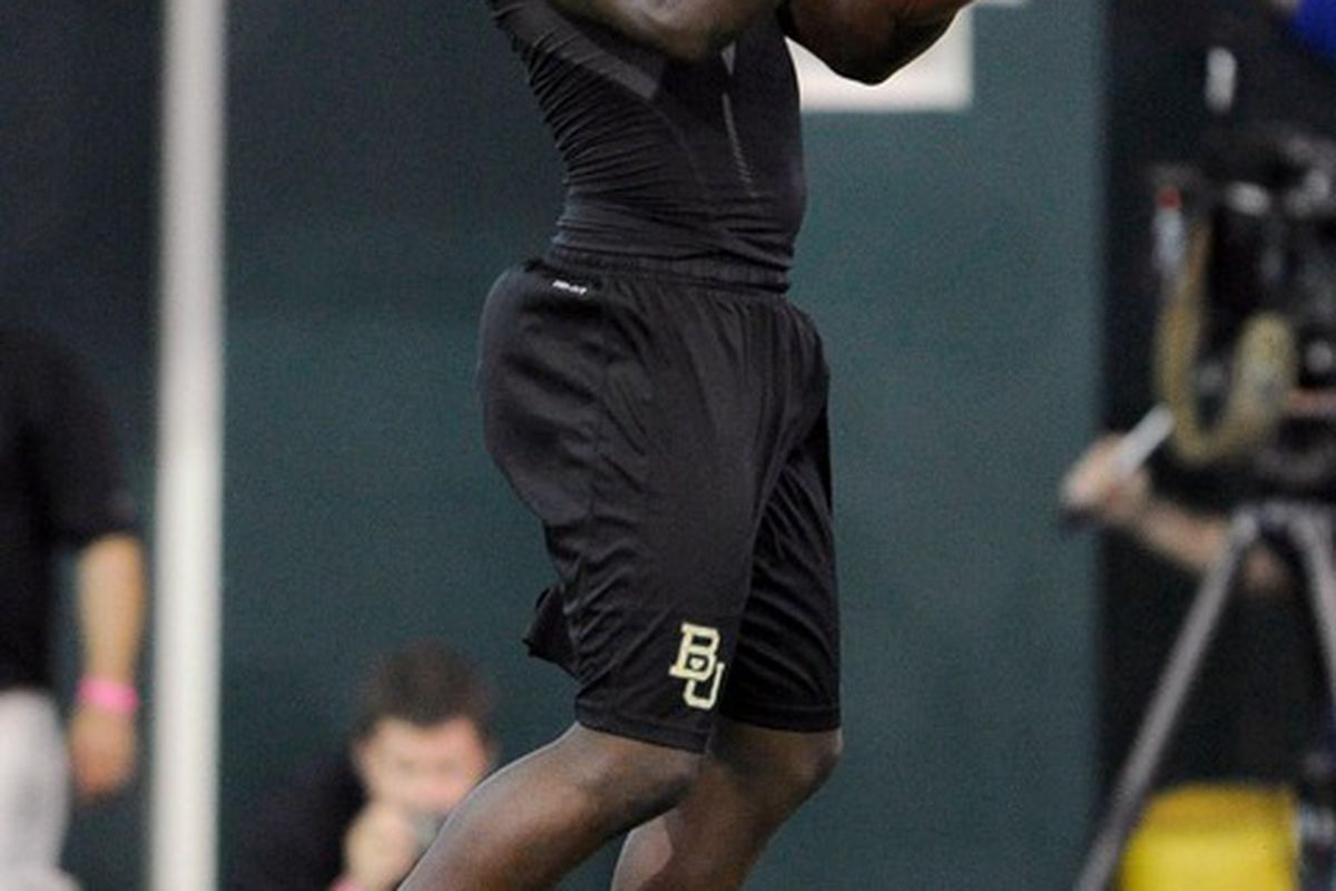 Mar 21, 2011; Waco, TX, USA; Baylor Bears wide receiver Kendall Wright (1) catches a pass during the Baylor pro day at the Allison Indoor Facility. Mandatory Credit: Jerome Miron-US PRESSWIRE